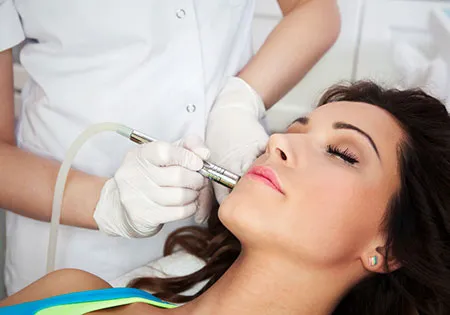 Woman getting laser skin resurfacing